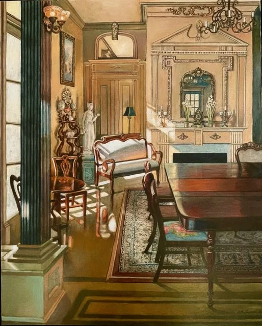 Victorian-style dining room with a wooden table and chairs, a decorative fireplace, a mirror, and antique sculptures, featuring green curtains and a patterned rug.
