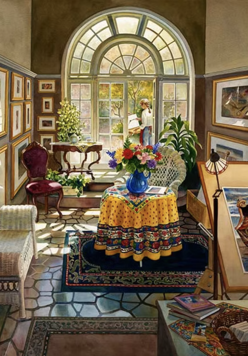 A cozy art gallery or sunroom with a large arched window, sunlight streaming in, and a woman reading outdoors. Inside, there is a round table with a colorful tablecloth and a blue vase with flowers, framed artwork on the walls, a white wicker chair, a velvet-upholstered chair, and artwork displayed on easels.