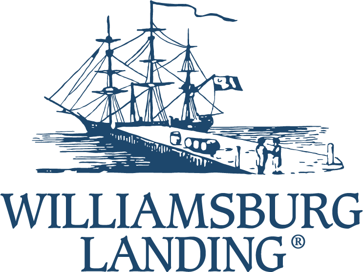 Illustration of a sailing ship docked at the waterfront with a person walking nearby, with the text 'Williamsburg Landing' below.