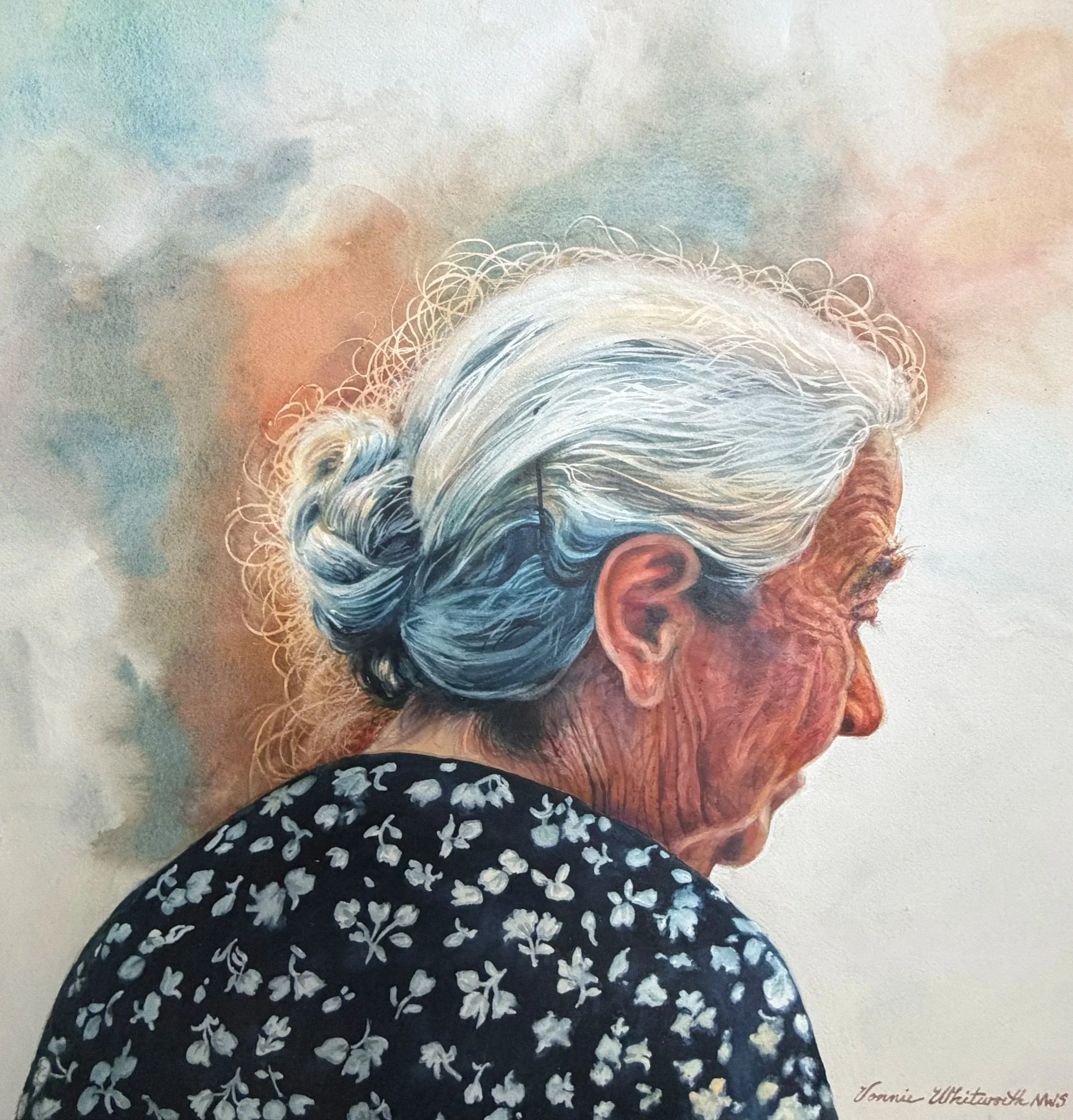 A watercolor portrait of an elderly woman with white curly hair, glasses, and a black dress with white floral patterns. The background has soft pastel shades, and the artist's signature, "Tonnie Whittemore M.S. S." is in the bottom right corner.