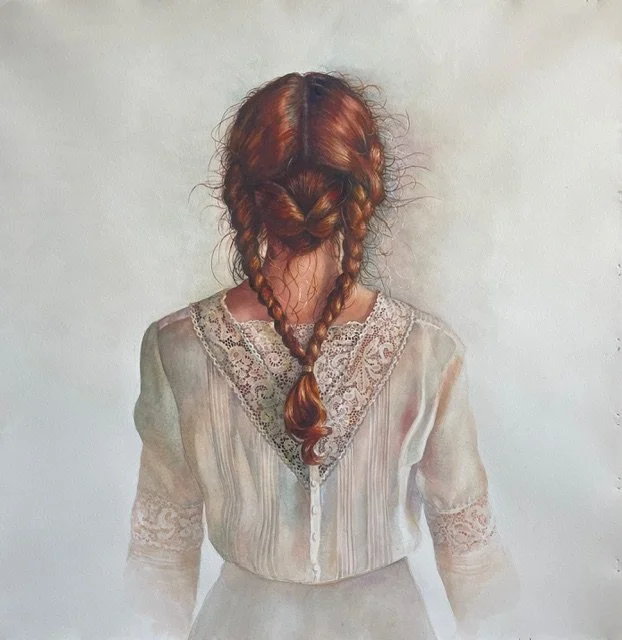 A woman with red hair styled in two braids, viewed from the back, wearing a vintage cream-colored dress with lace details.