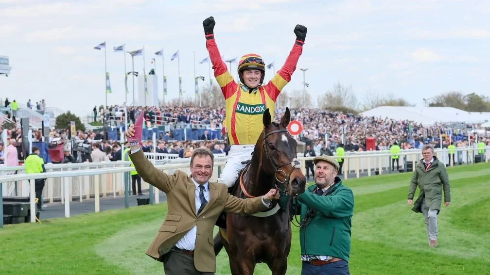 Horse Storming George winning the Top Novices Hurdle at Aintree