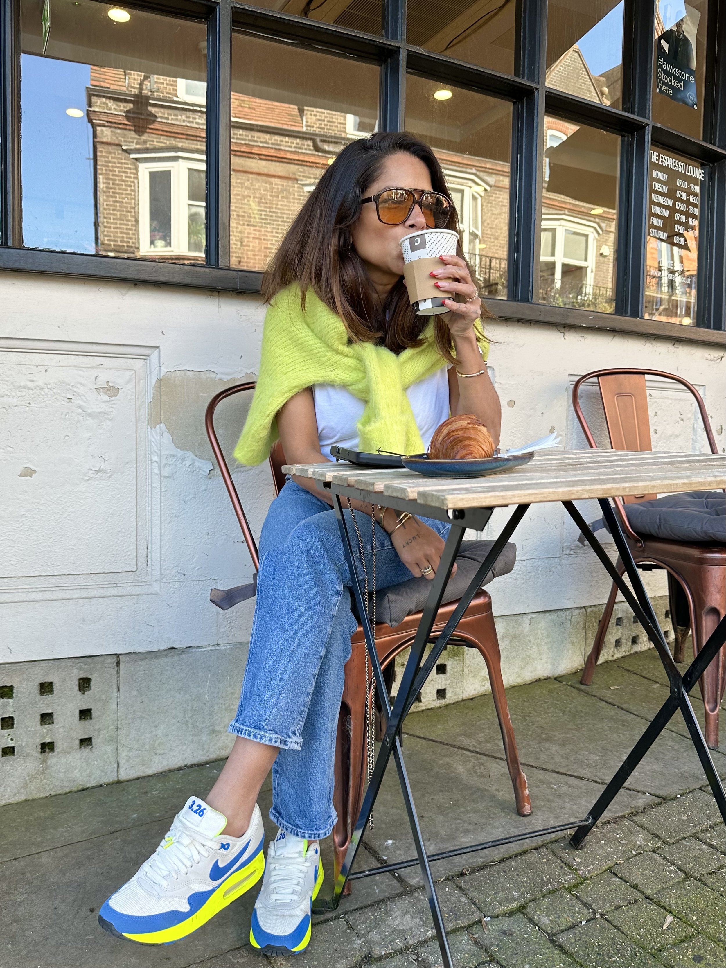 Social media content of Dilly Carter drinking coffee