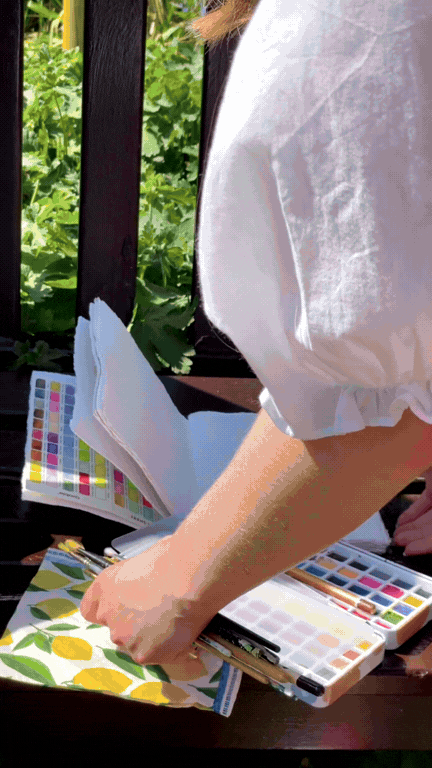 Social Media content of mum and daughter painting in a local garden