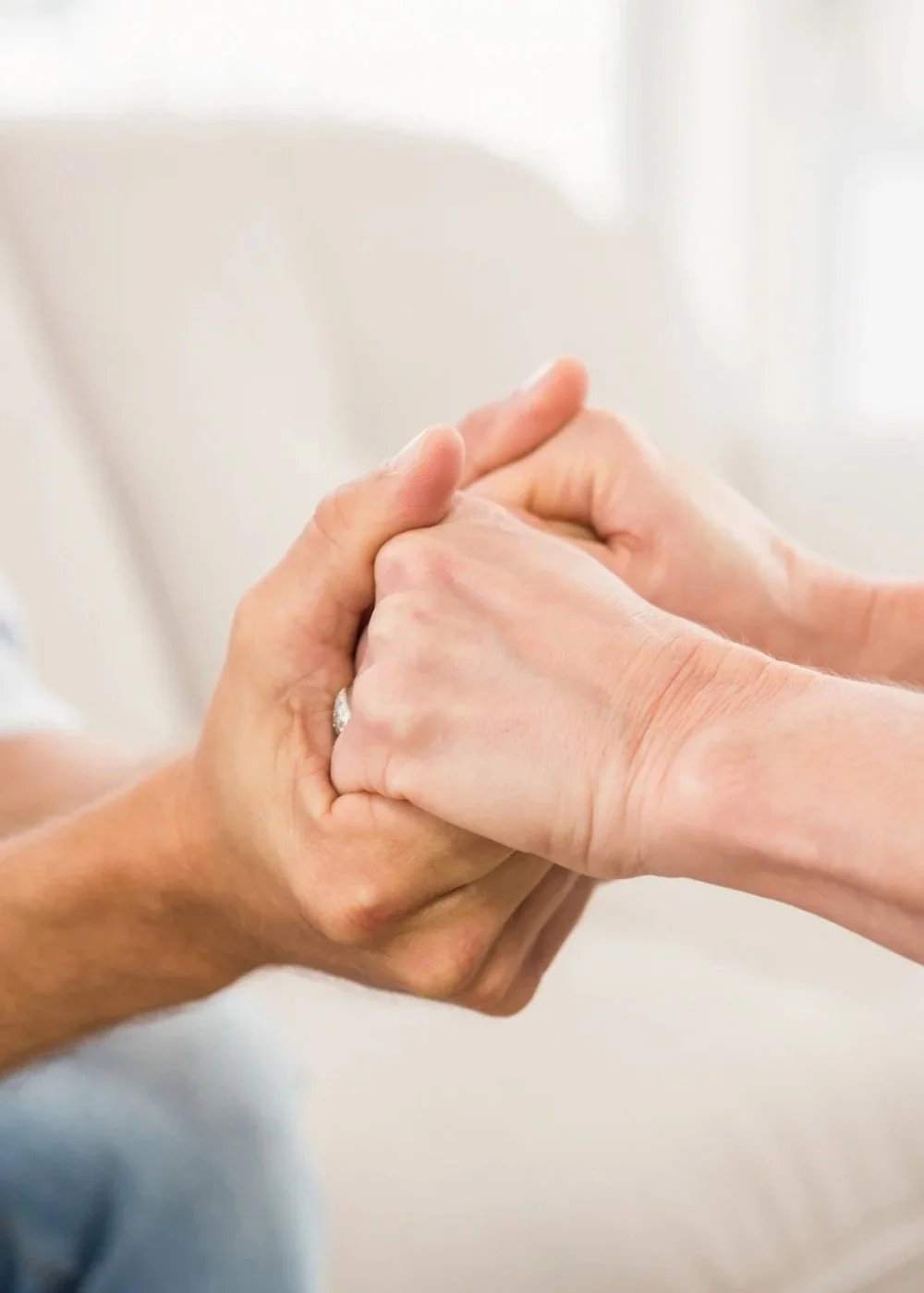 Supportive connection representing relationships, attachment work, and emotional healing.