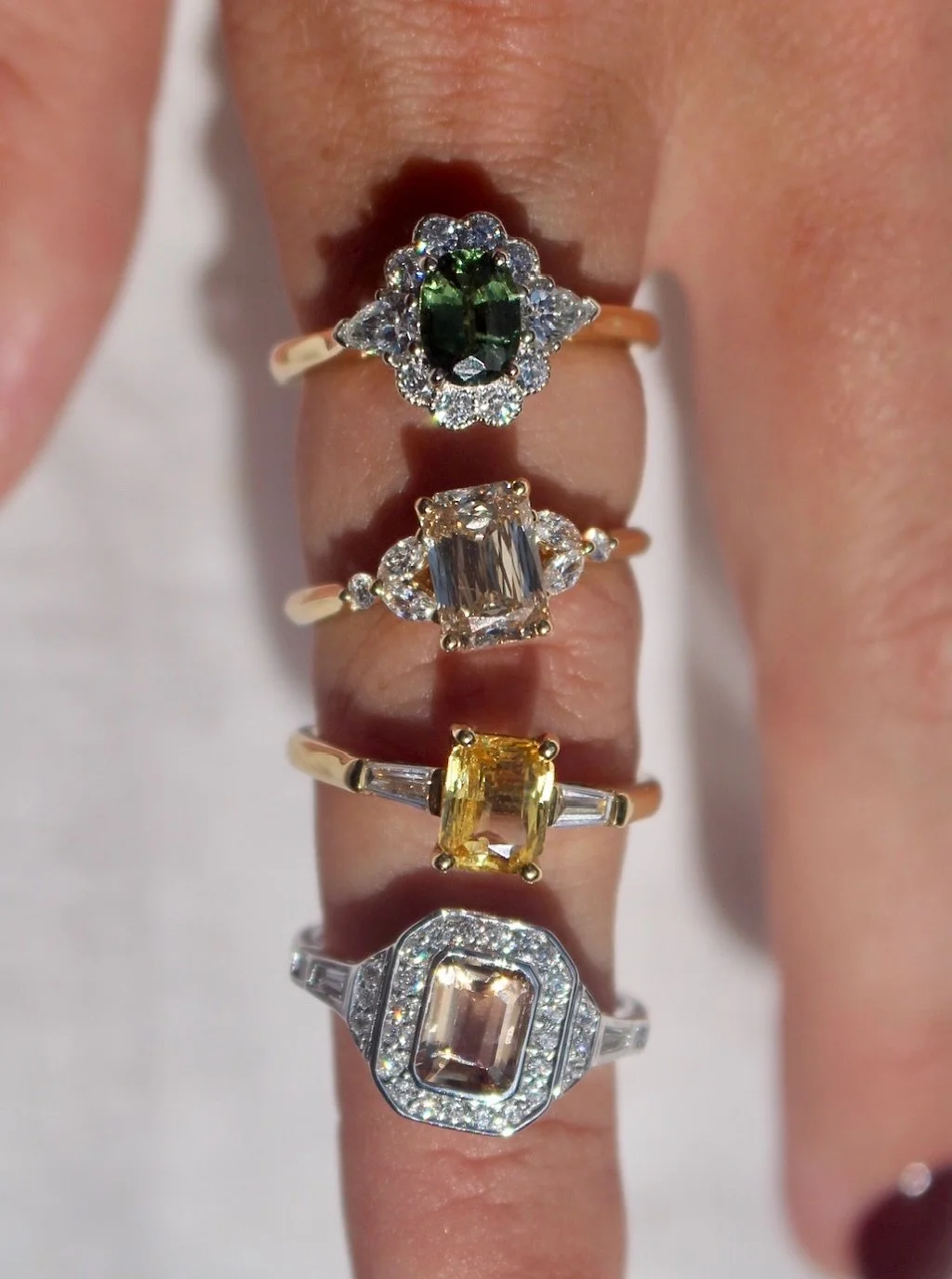 A little bit of everything. And somehow, it all works
💚🤎💛🧡

Four completely different rings, each with its own character. Coloured gemstones, unusual diamond cuts and vintage inspired clusters. Proof that your ring stack doesn&rsquo;t have to mat