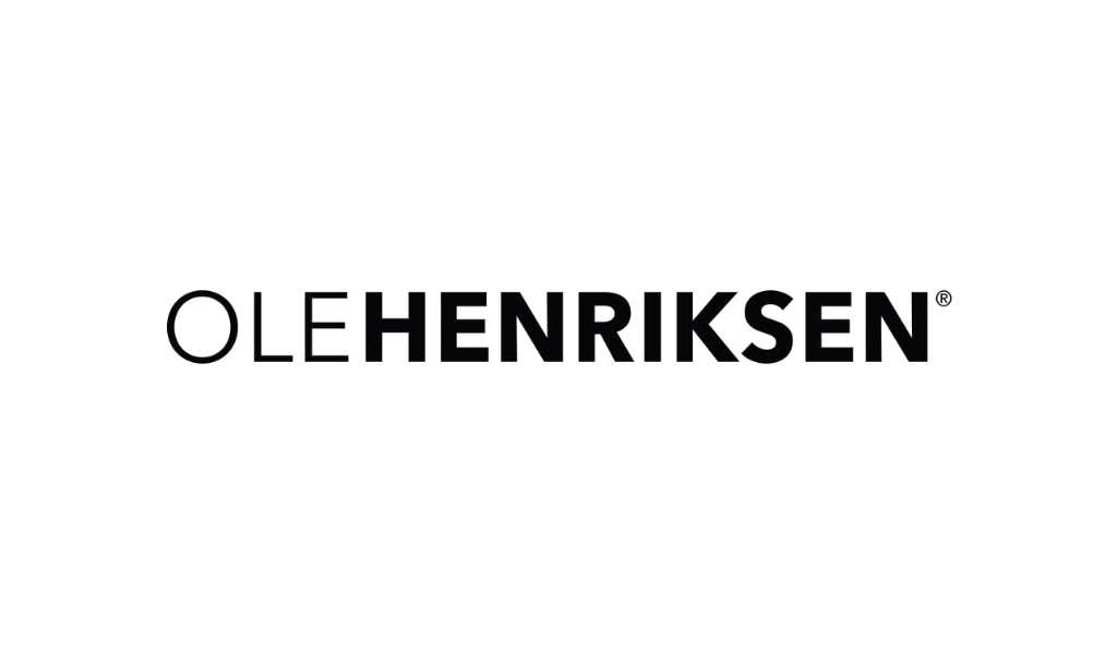 The logo of Ole Henriksen, a skincare brand, featuring a stylized black tree with the brand name beneath.