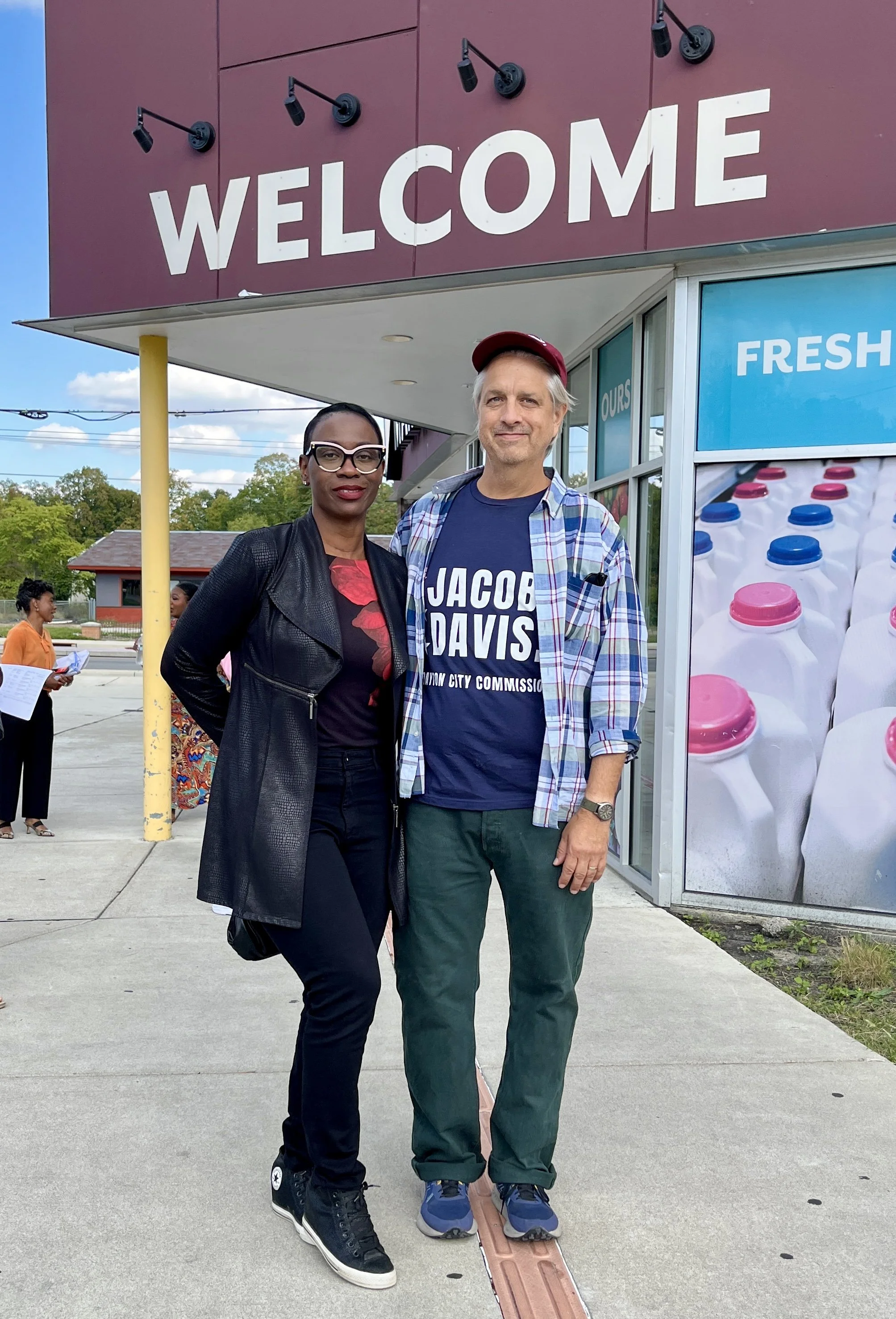 Senator Nina Turner and Joseph Abrams standing in front of Gem City Market