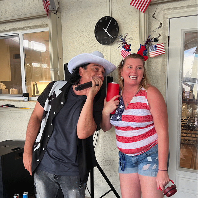 Armando from Lucy's Fur Baby singing at a private event for the 4th of July