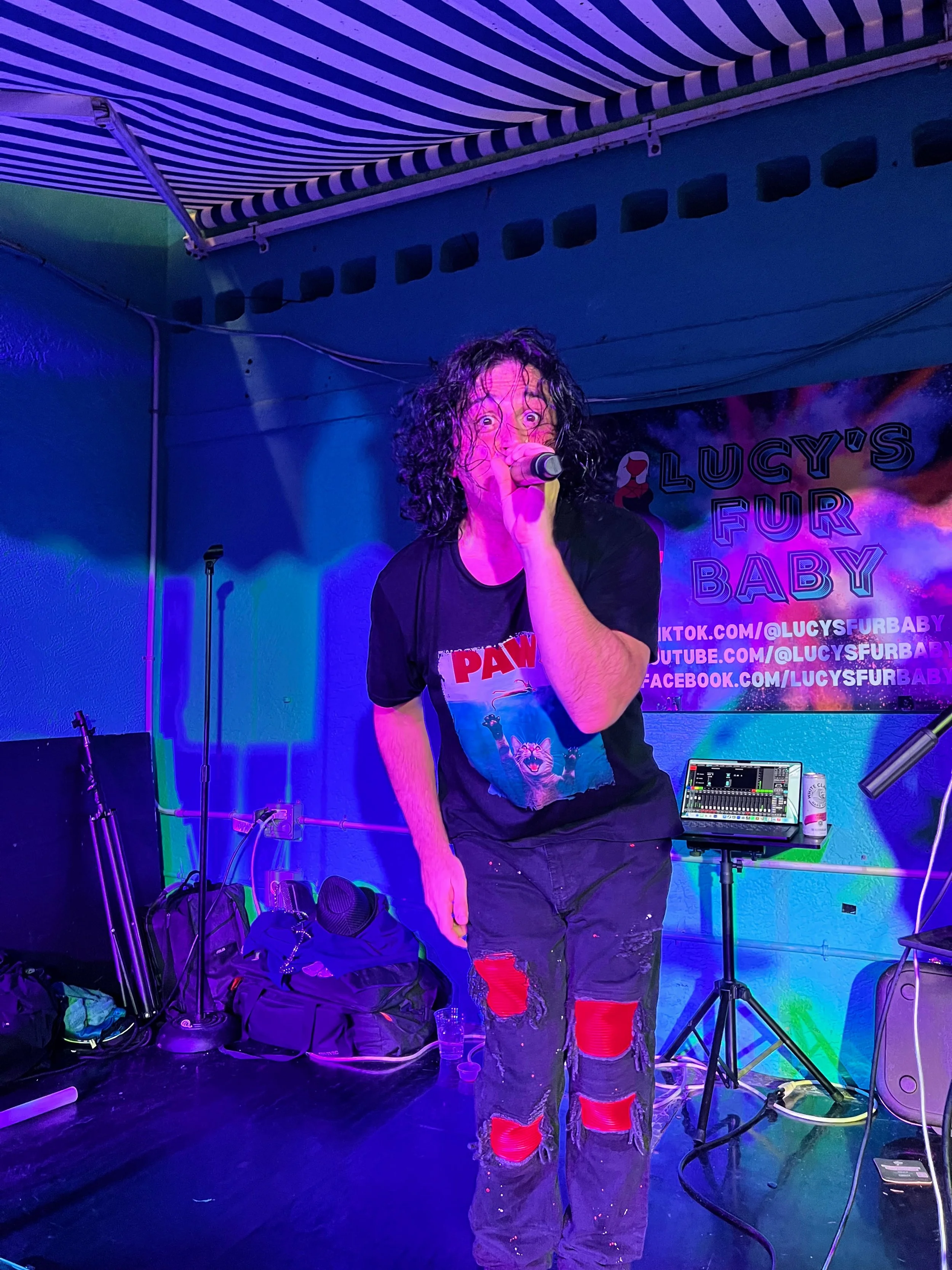 Armando from Lucy's Fur Baby having fun on stage