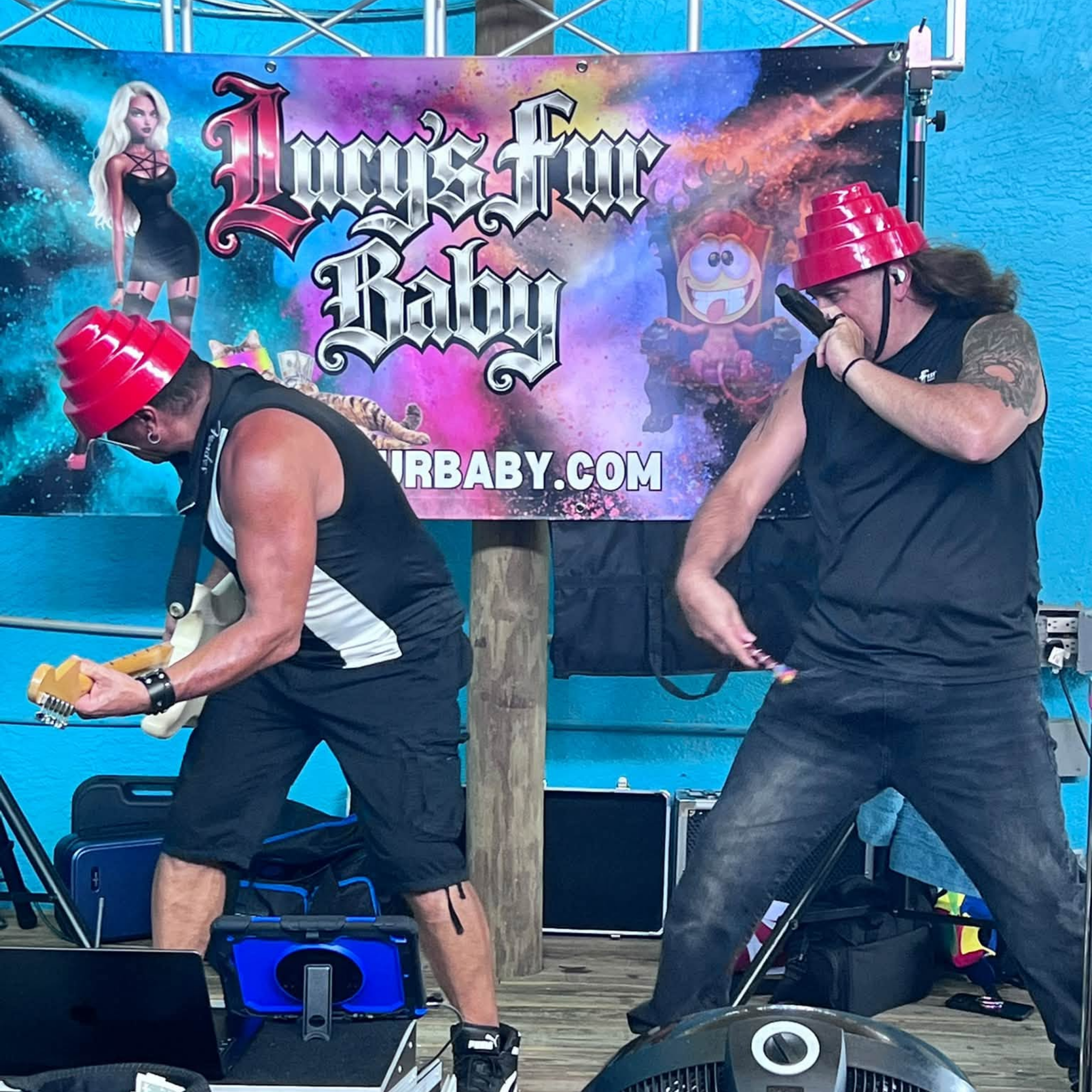 Lucy's Fur Baby using whips during "Whip It"