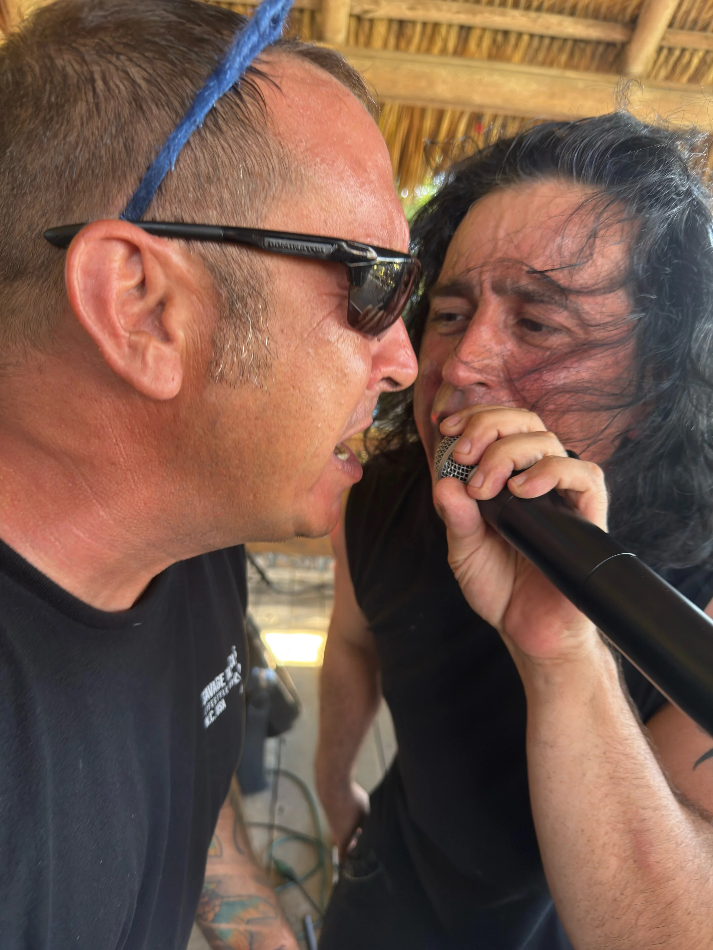 Armando from Lucy's Fur Baby singing with the crowd