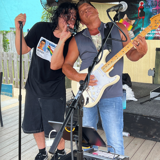 Armando and Tino from Lucy's Fur Baby performing at Johnathan's Pub