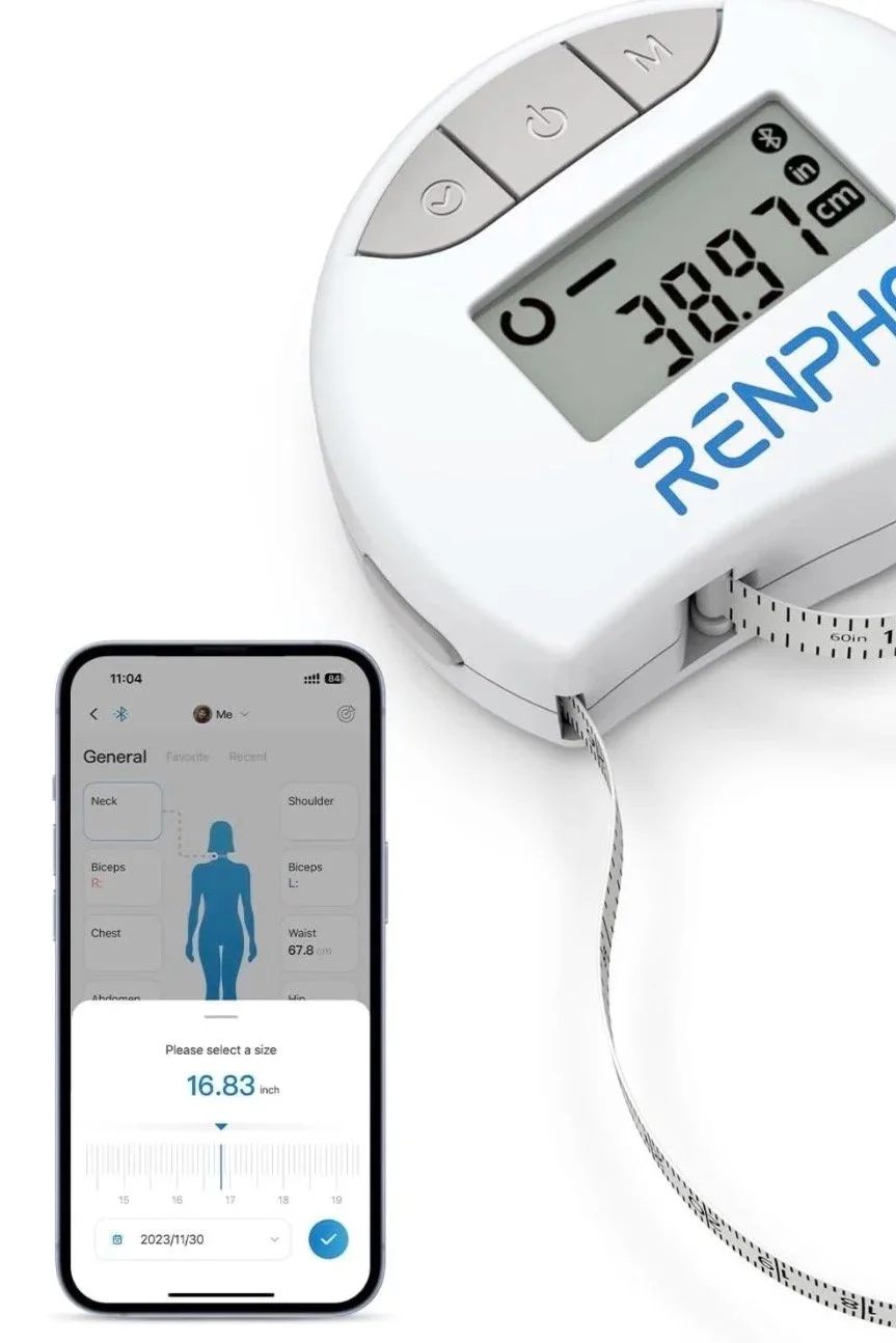 A digital blood pressure monitor displaying 138 over 71 mmHg and an app on a smartphone showing a body measurement and a waist size of 16.83 inches.