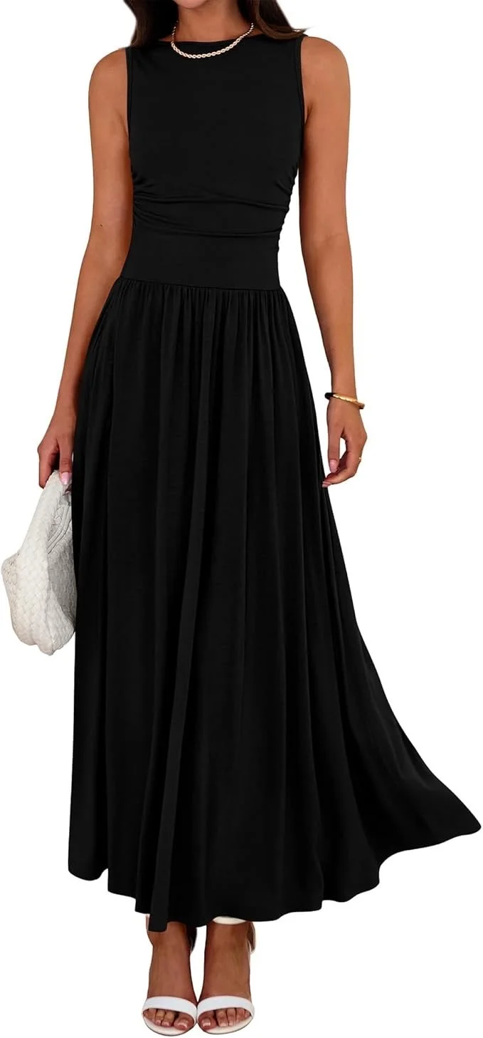 Woman wearing a sleeveless black dress, white high-heeled shoes, a pearl necklace, gold bracelet, and holding a white textured clutch.