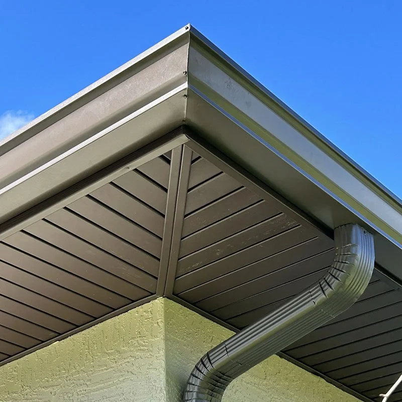 Downspout installation in Hernando, MS ensuring proper water flow and preventing pooling around the home’s foundation.