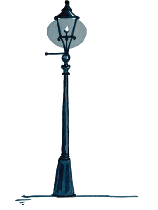A vintage street lamp post with a lantern-style light fixture.