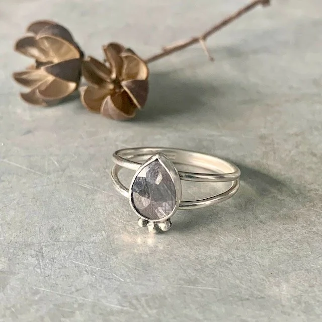 hand fabricated sterling and gray sapphire ring