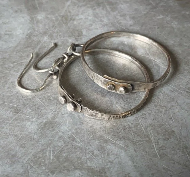 hand forged riveted sterling silver hoop earrings