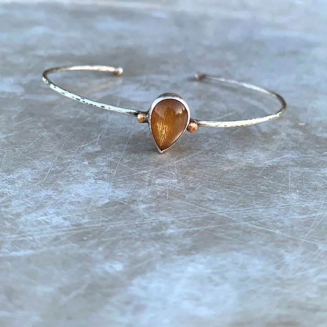 sterling silver, bronze, and sunstone cuff bracelet