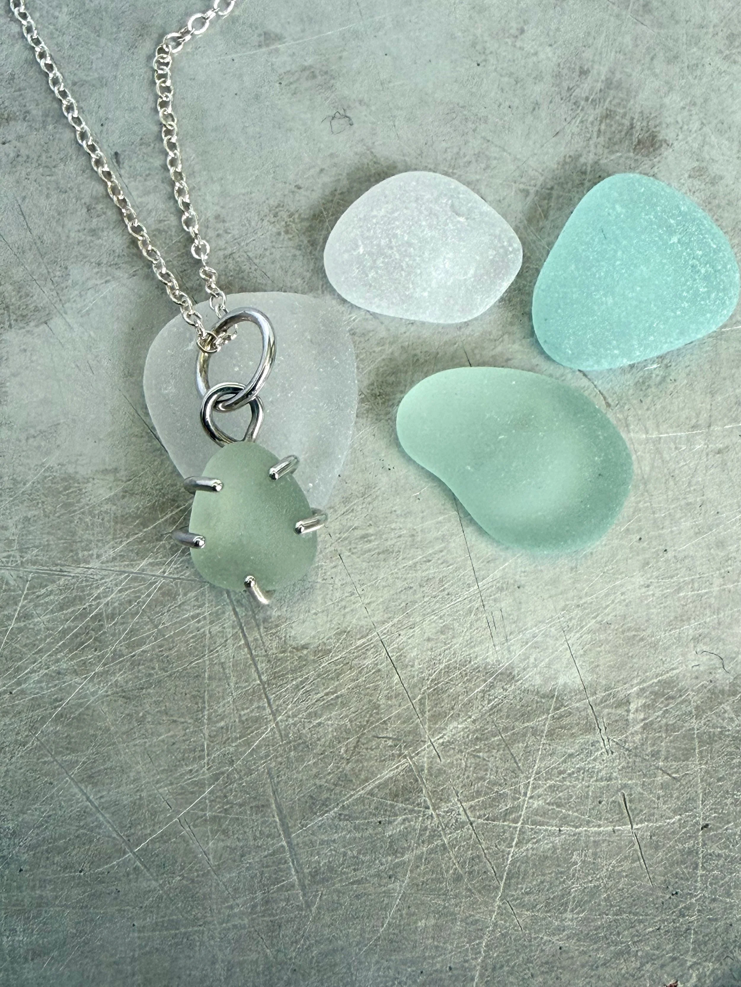 sterling silver claw-set beach glass pendant