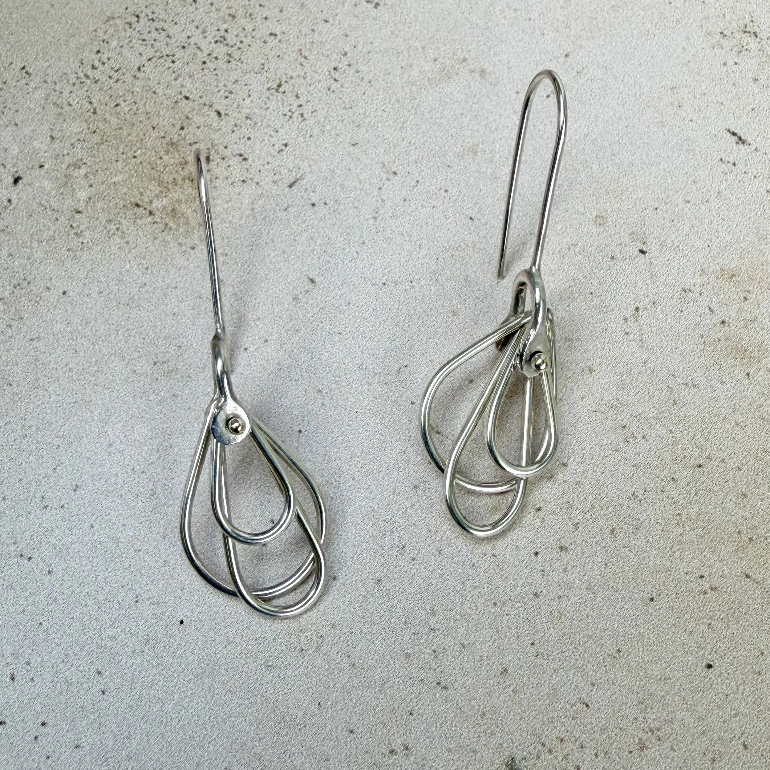 Kinetic silver petal drop earrings