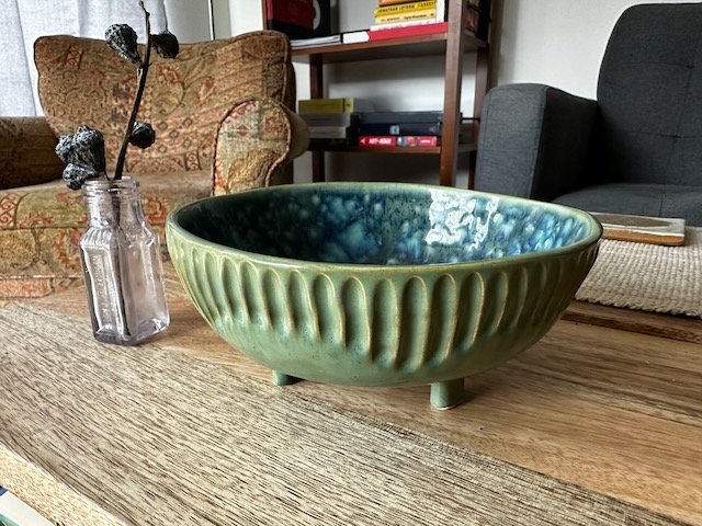 footed bowl with hand carving
