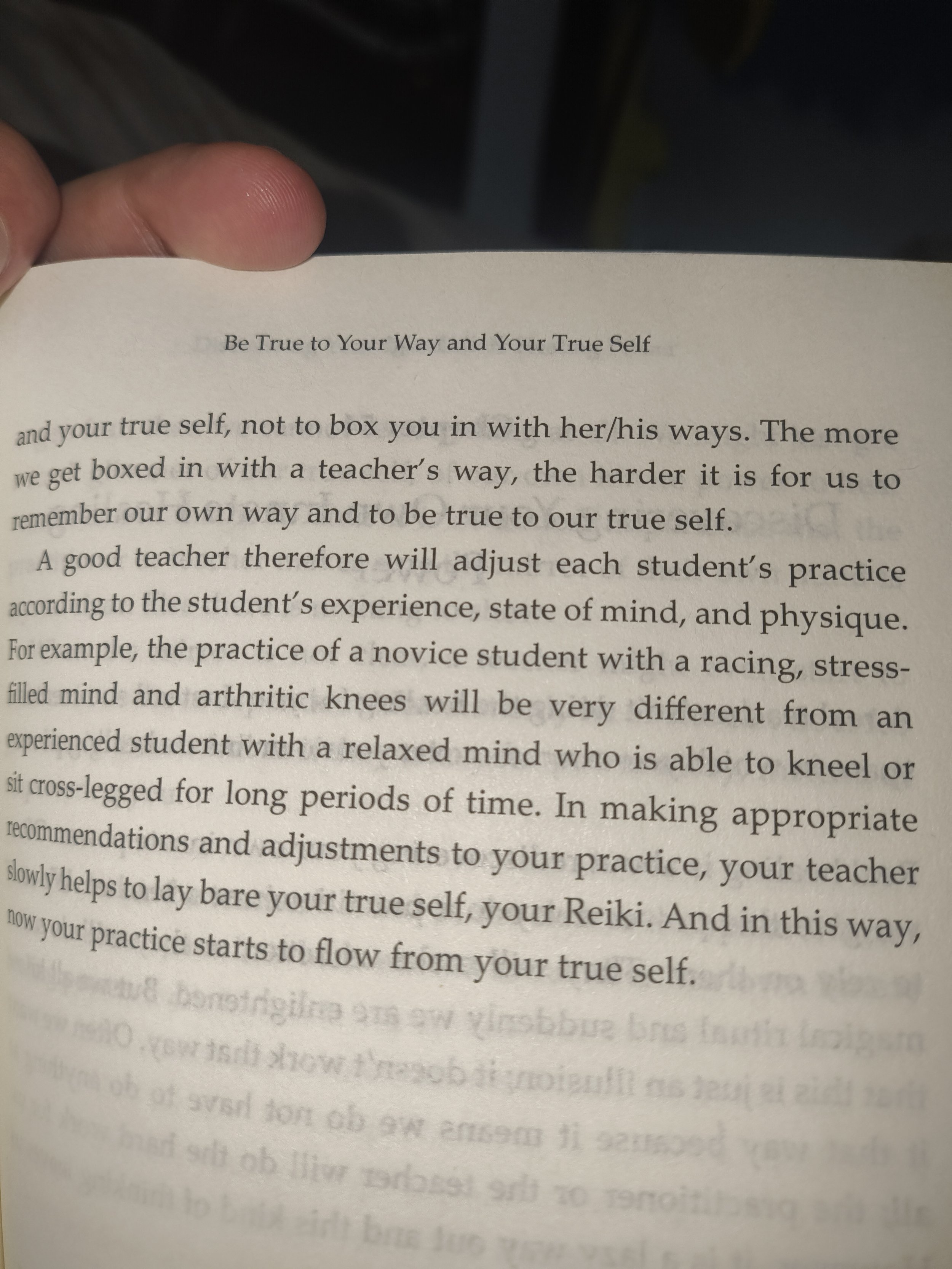 Close-up of a book page with the title 'Be True to Your Way and Your True Self.' The page contains text about being true to oneself and adjusting practice according to individual experience.