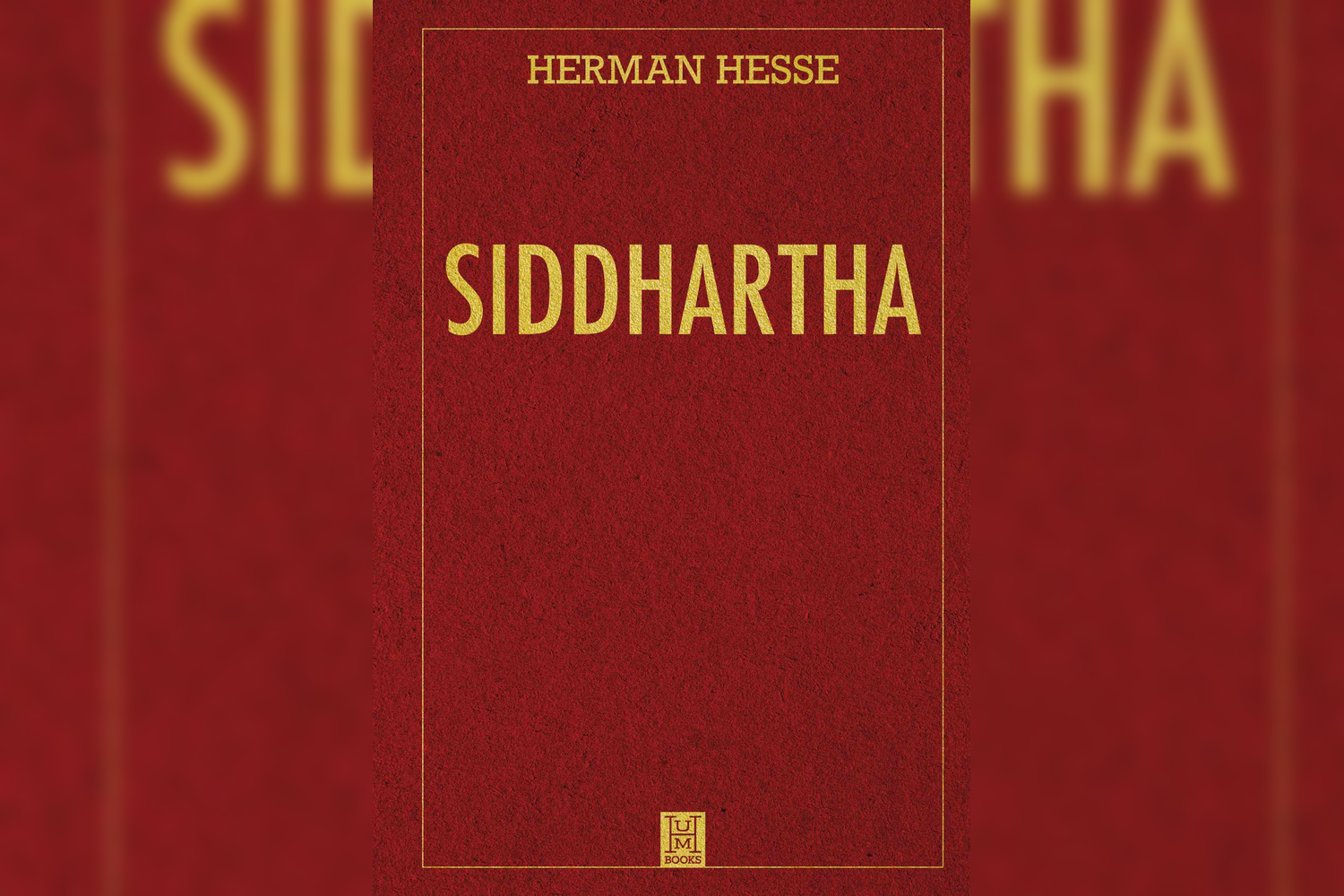 Close-up of a red book cover titled 'Siddhartha' by Herman Hesse, published by TUTM Books.