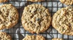 Oatmeal raisin cookies on a wire cooling rack.