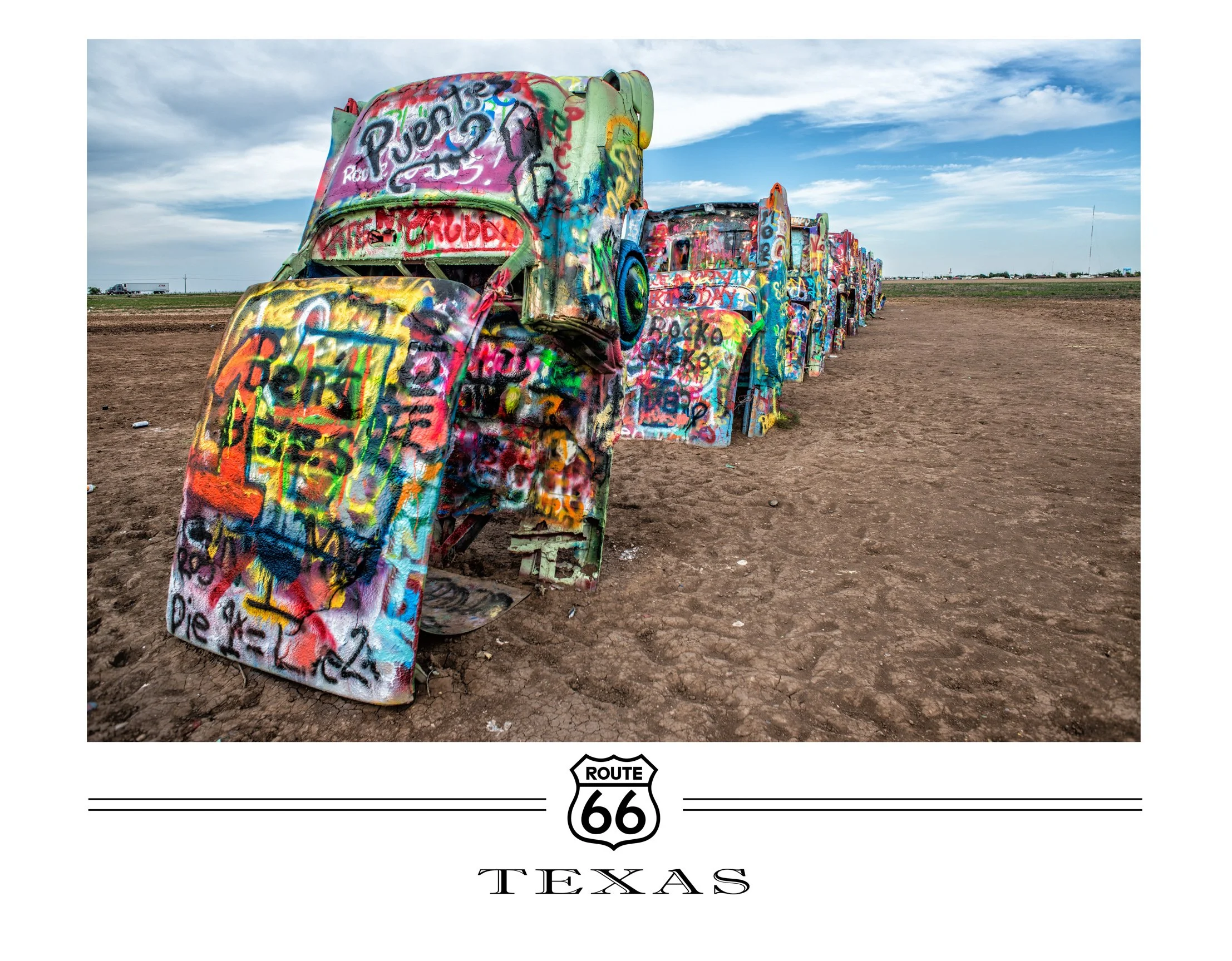 Line of vintage Cadillacs covered in colorful graffiti on a dirt road in Texas, with a blue sky and scattered clouds