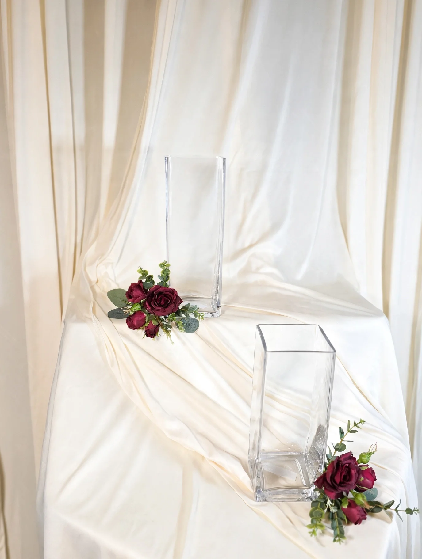 glass_vases_burgundy_roses.webp