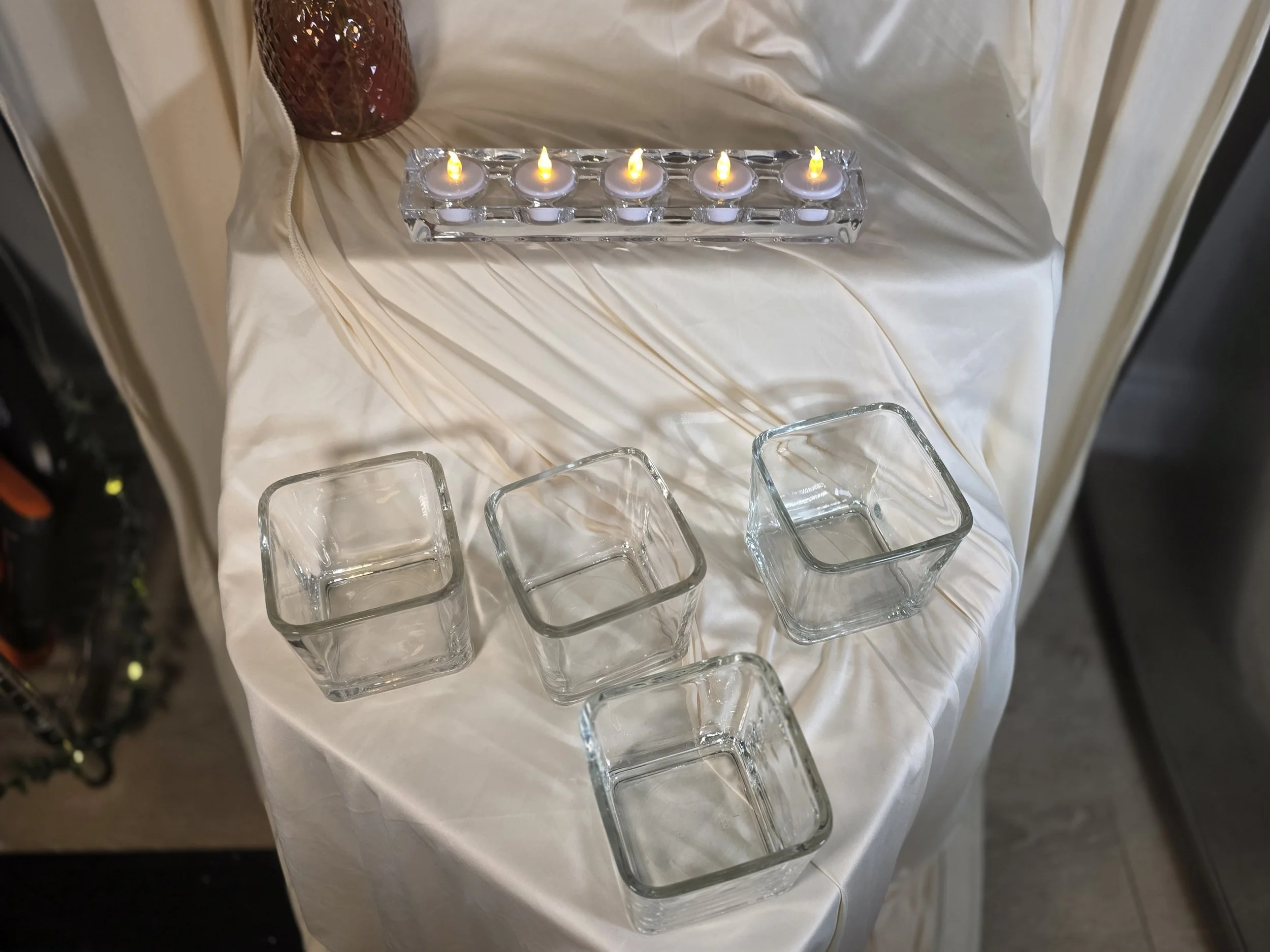 square vases and votive strip.jpg