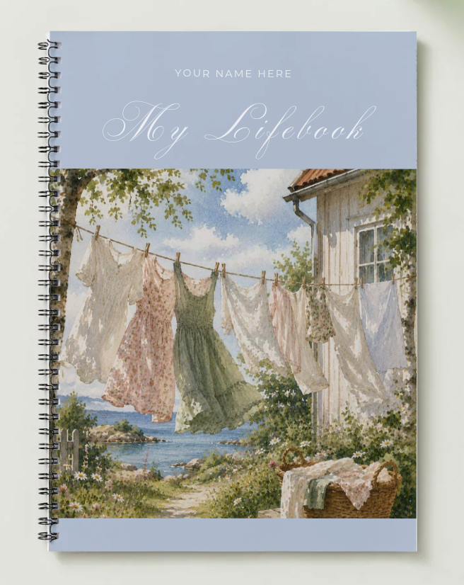 linen dresses drying on a line by the sea