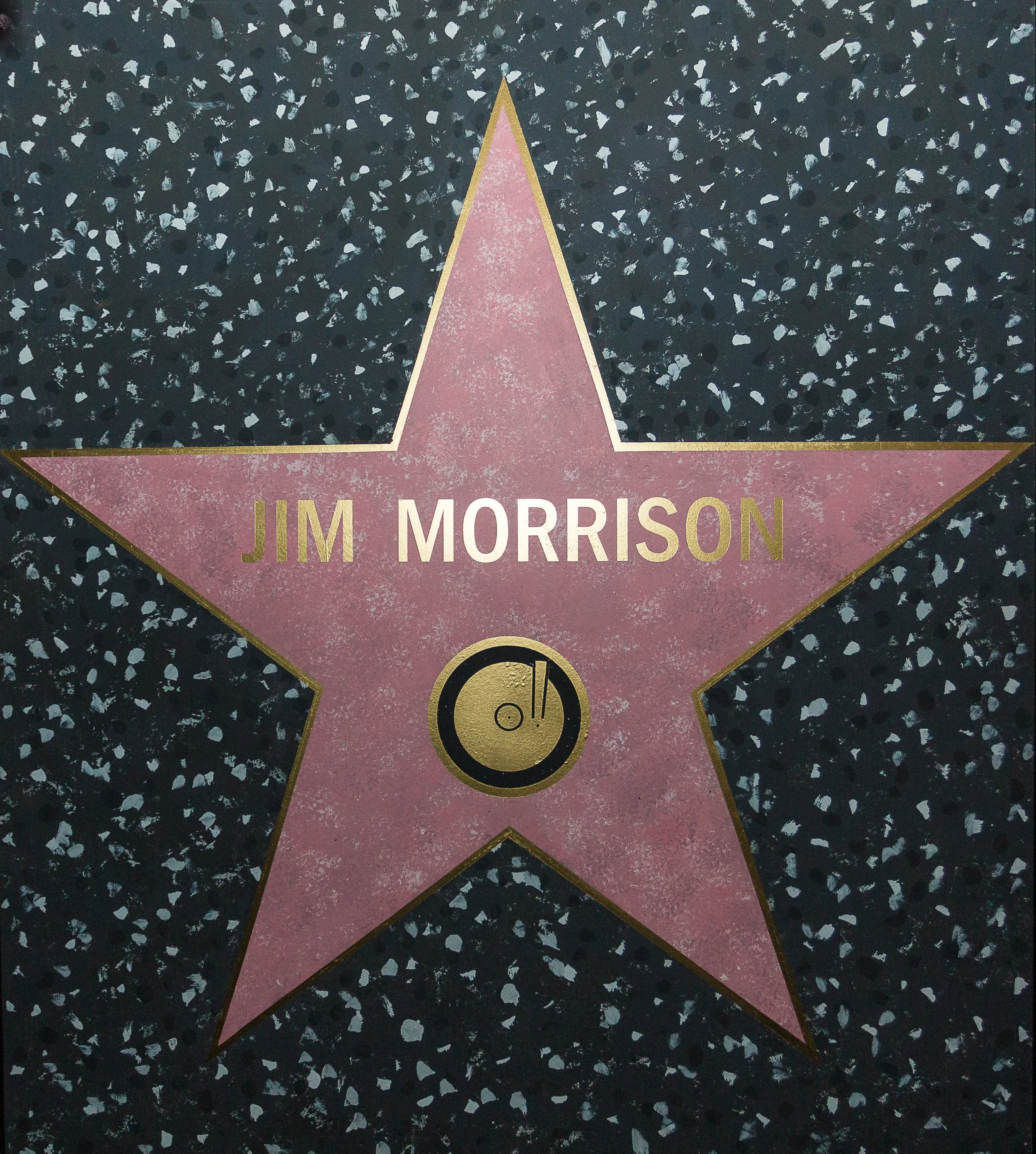 Pink star on the Hollywood Walk of Fame with the name 'Jim Morrison' engraved in gold, surrounded by a black terrazzo background with silver specks.
