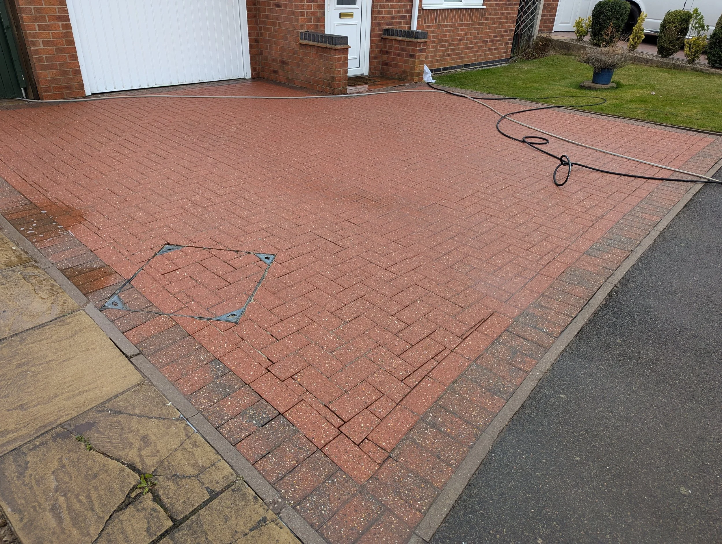 A block paved driveway that has just been restored in Ripley by Jet Set Wash. Now ready for a Re-sand