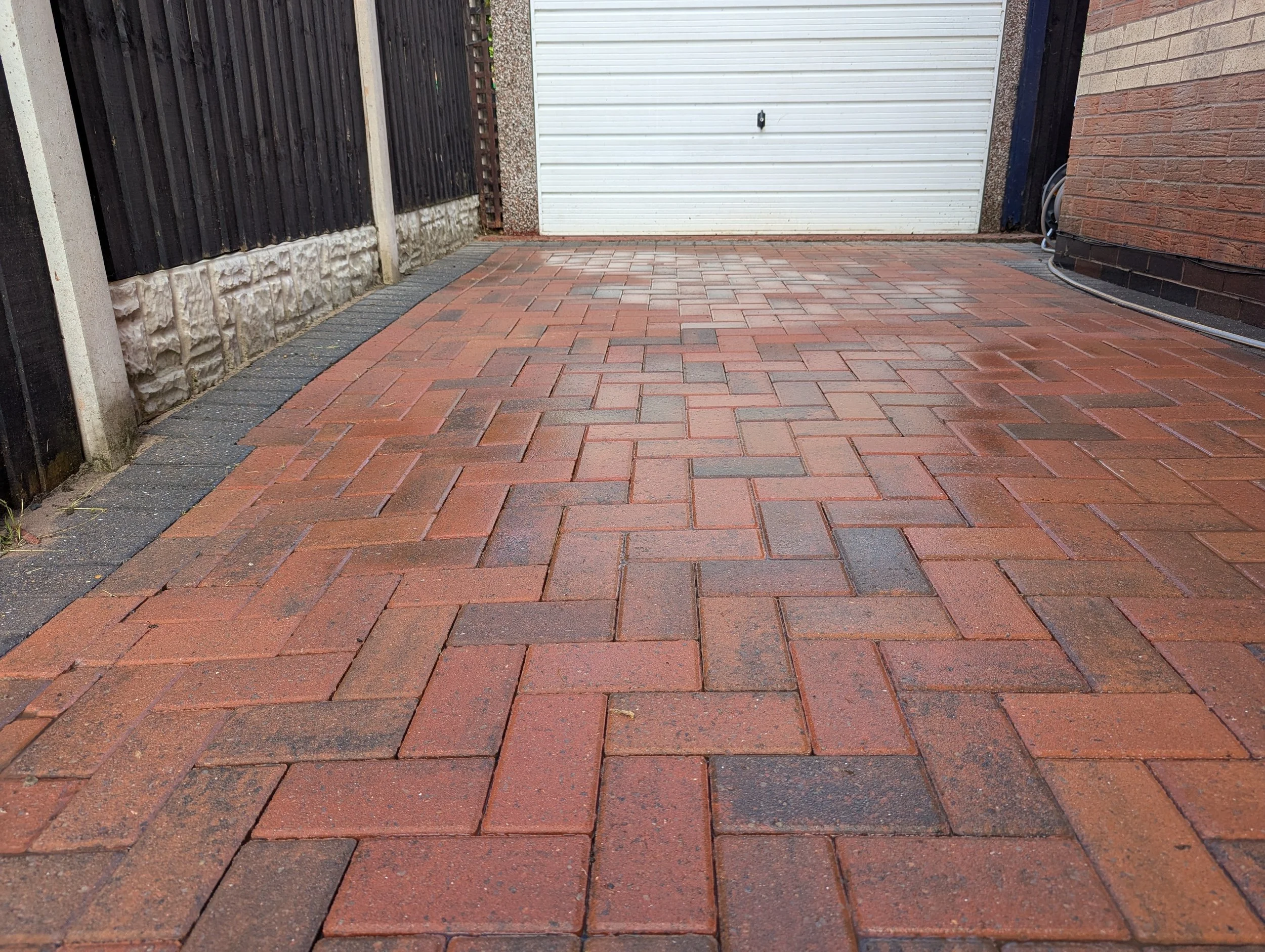 A block paved driveway photo, this driveway based in Sutton-In-Ashfield was just cleaned by Jet Set Wash - Exterior Cleaning. The drive is now ready for a resand