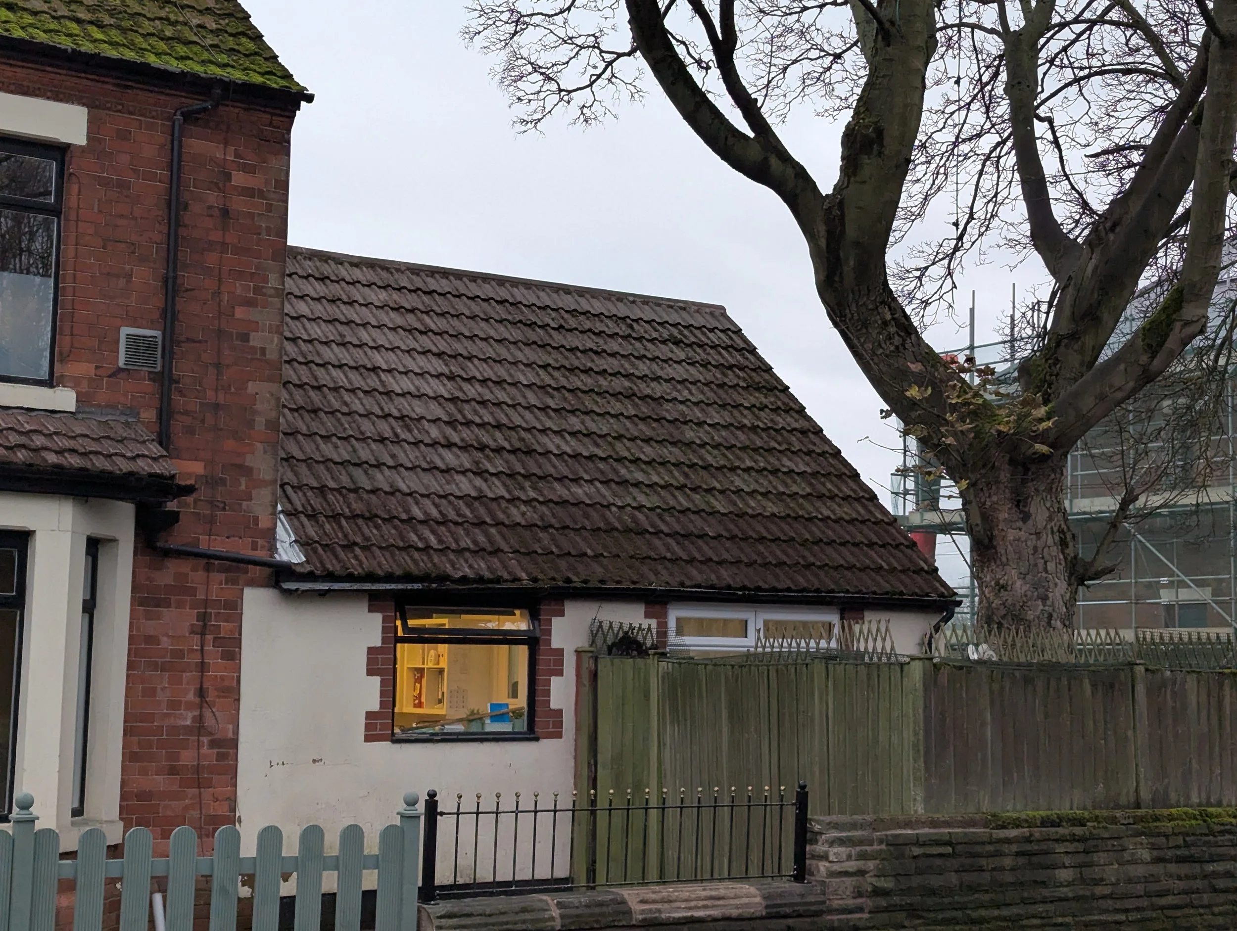 View of a house with a tiled roof after it has been scraped and chemically treated by Jet Set Wash - Exterior Cleaning