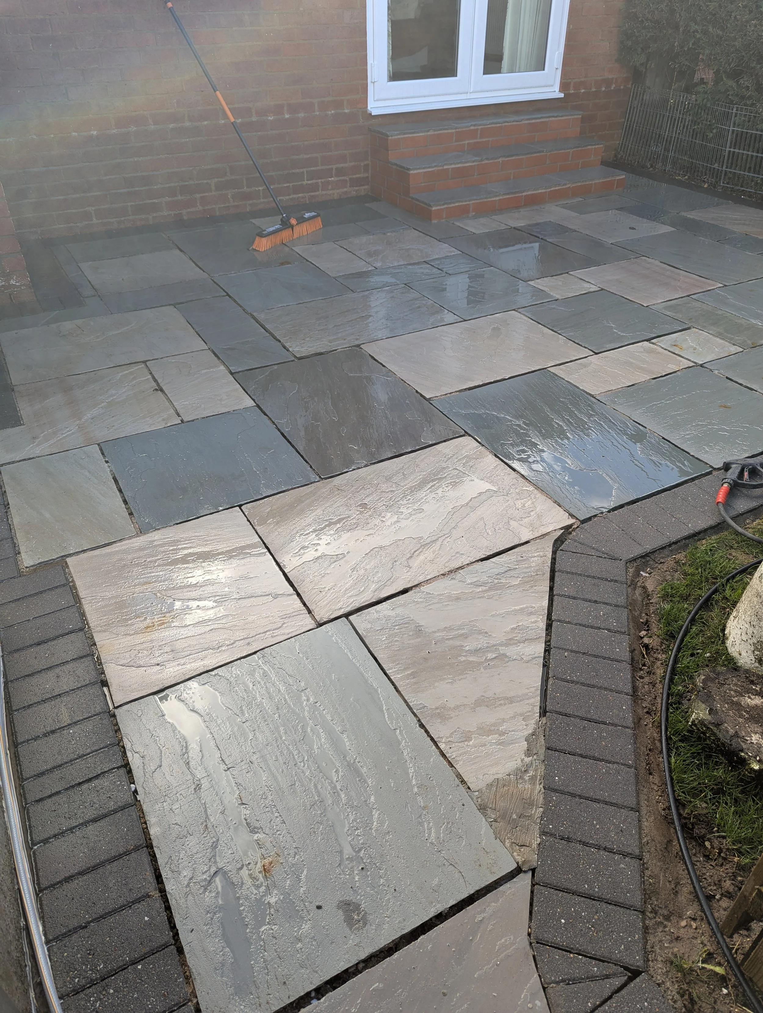 Patio after being cleaned, pressure washed and softwashed by Jet Set Wash - Exterior Cleaning