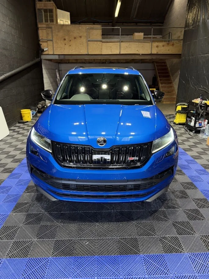 A blue Skoda SUV - Super gloss finish after application of premium STEK PPF film in Manchester at Lukas Car Detailing