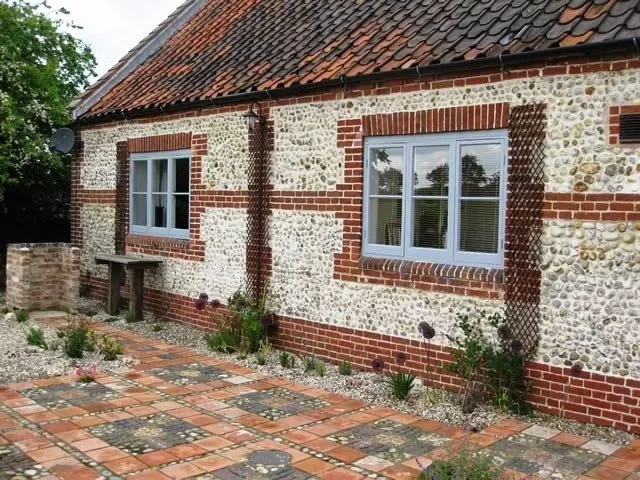 Brick built BBQ and table near patio