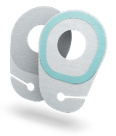 A white and teal medical or dental device with a digital screen.