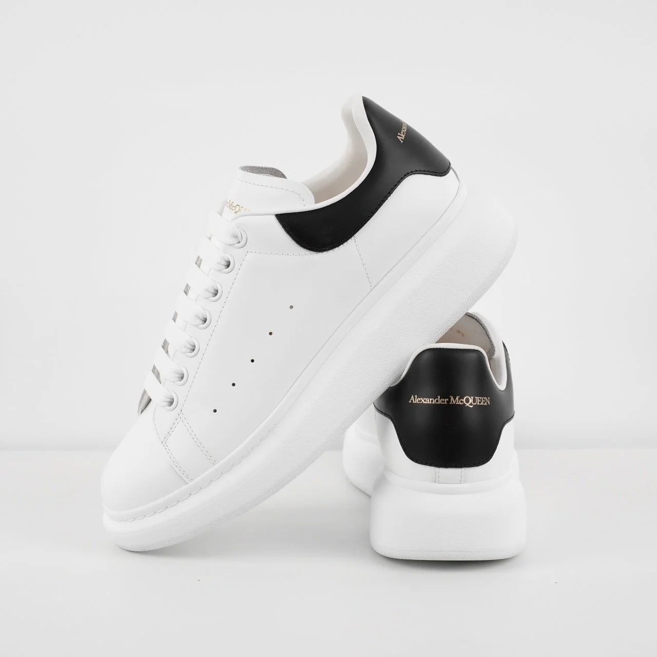 Al*xand*r McQu**n White Sneakers