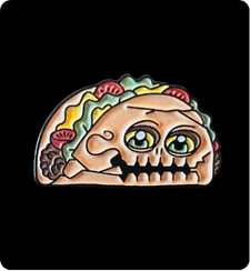 Enor taco monster enamel pin on black background