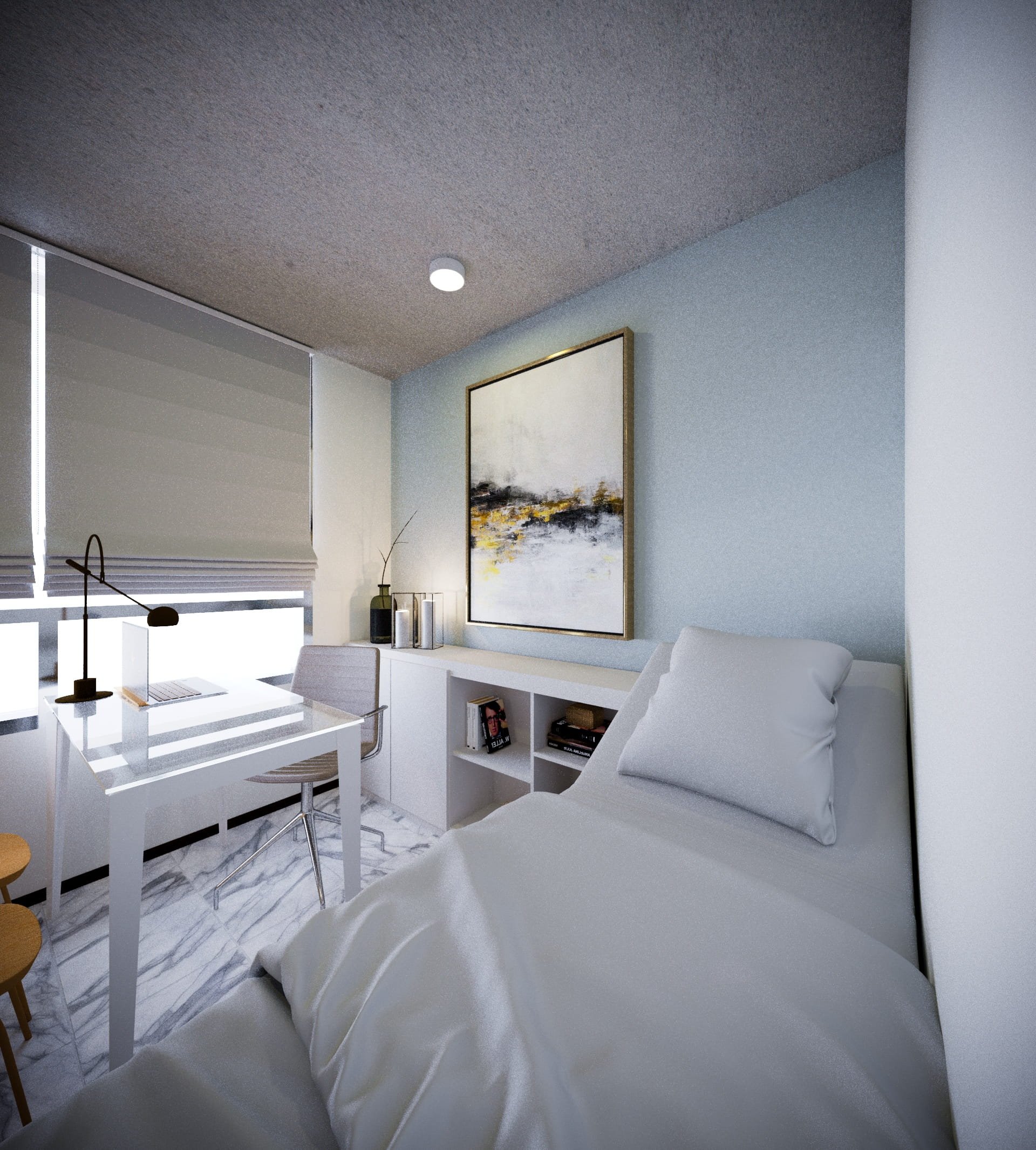 A modern, minimalist interior with white and light gray tones, featuring a white desk with a laptop, chairs, a white armchair with a pillow, a wall art, and a few decorative items, illuminated with natural and soft lighting.