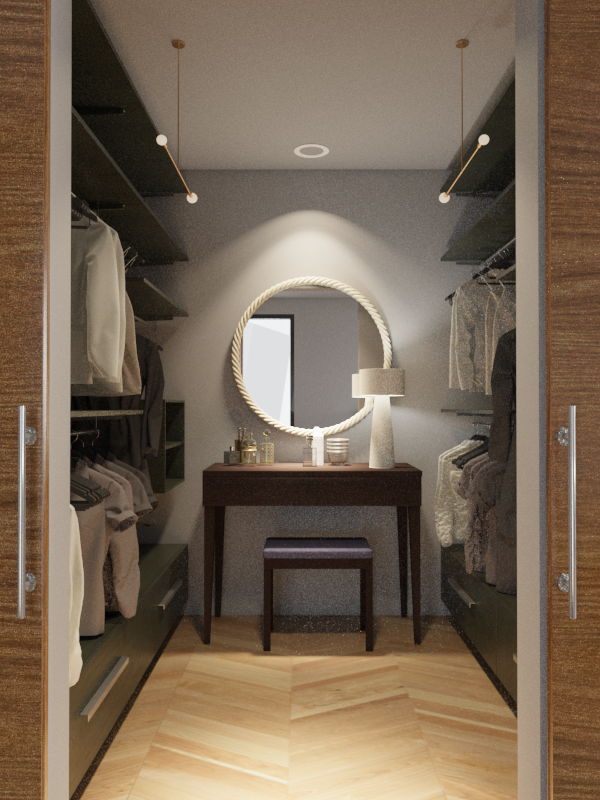 Walk-in closet with hanging clothes on both sides, a wooden vanity in the center with a mirror, a small bench, a table lamp, and perfume bottles.