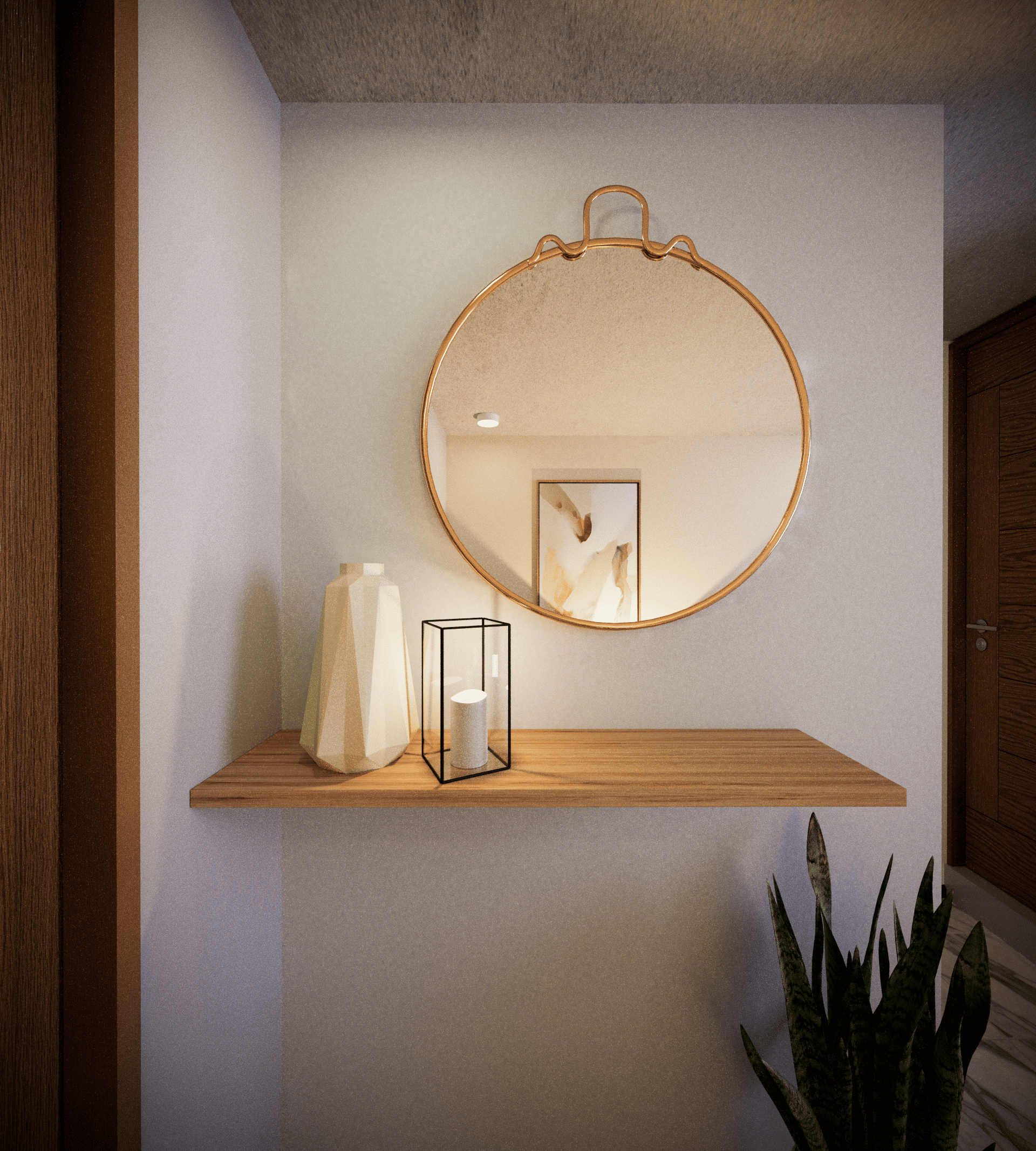 Decorative round mirror with gold frame hanging on a beige wall. Below the mirror, a wooden shelf holds a tall beige geometric vase, a black metal frame, and a white cylindrical container. Part of a framed abstract art piece is visible on the wall.