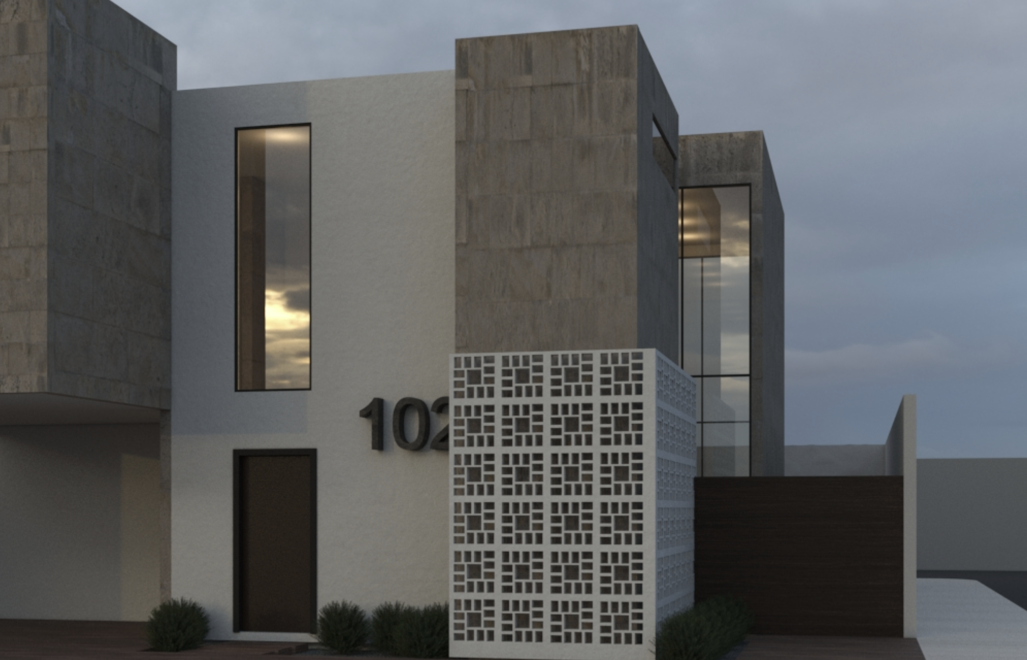 Modern building with concrete and white walls, large window, and patterned white screen in front against cloudy sky.