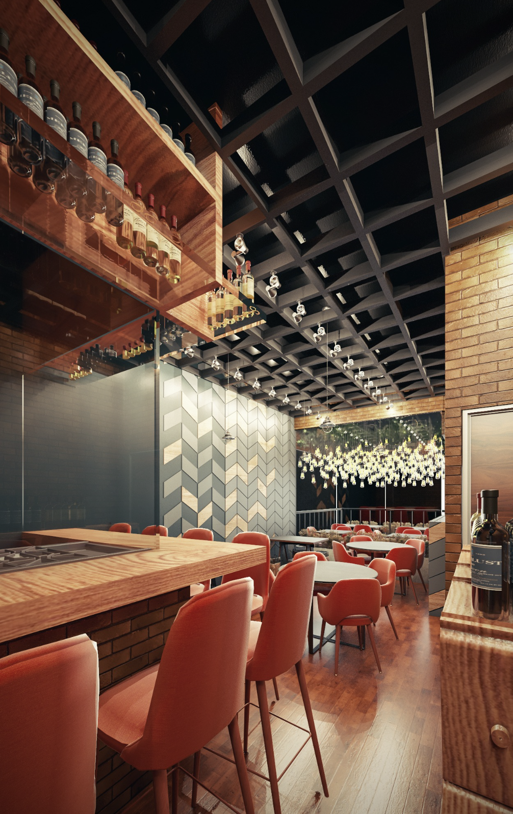 Interior of a modern restaurant or bar with pink upholstered chairs, wooden tables, a brick wall, and hanging light fixtures. There are bottles of wine on a wooden shelf and a decorative chandelier of hanging lights in the background.