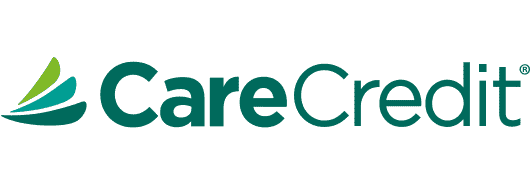 CareCredit logo with stylized leaves in green and blue.